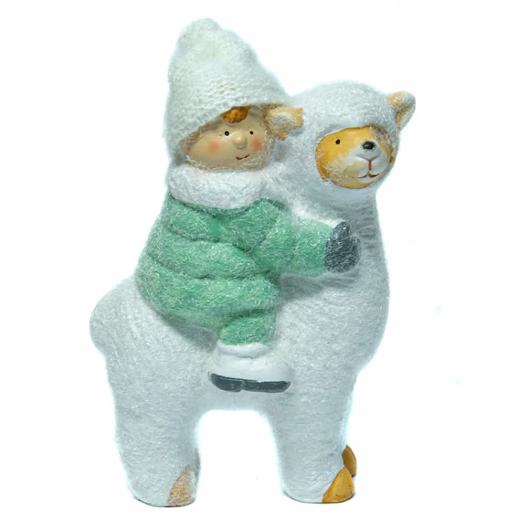 Figurka chłopiec na lamie fot.2