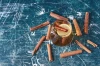 cinnamonnd-lemons-with-cup-drink-blue kopia.webp