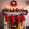fireplace-decorated-with-christmas-motifs-red-socks kopia.webp