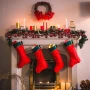 fireplace-decorated-with-christmas-motifs-red-socks kopia.webp