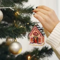 mother-with-cute-daughter-standing-near-christmas-tree kopia 2.webp